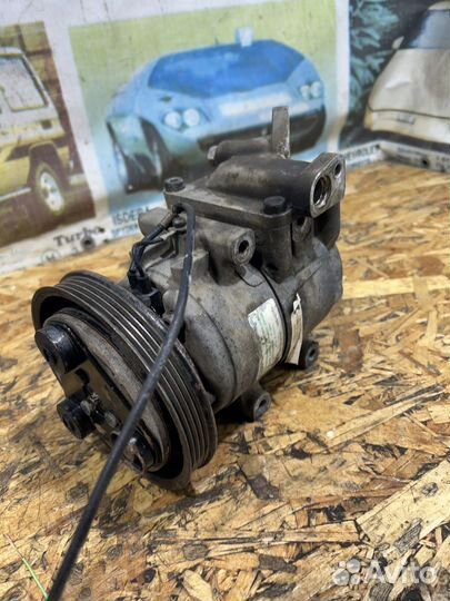 Компрессор кондиционера Киа Спектра