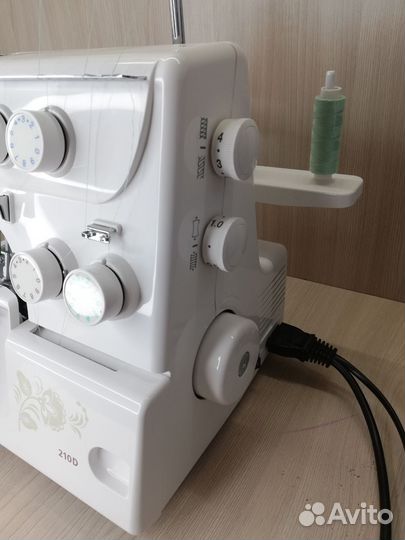 Оверлок Janome 210 d