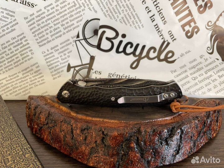 Складной нож из дамасской стали