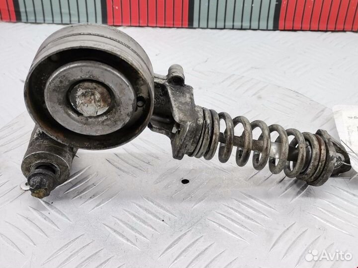 Натяжитель Opel Astra H/Family рест. 2011