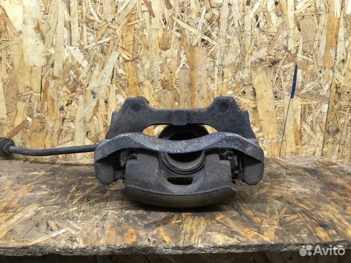 Суппорт тормозной передний левый Skoda Fabia 2