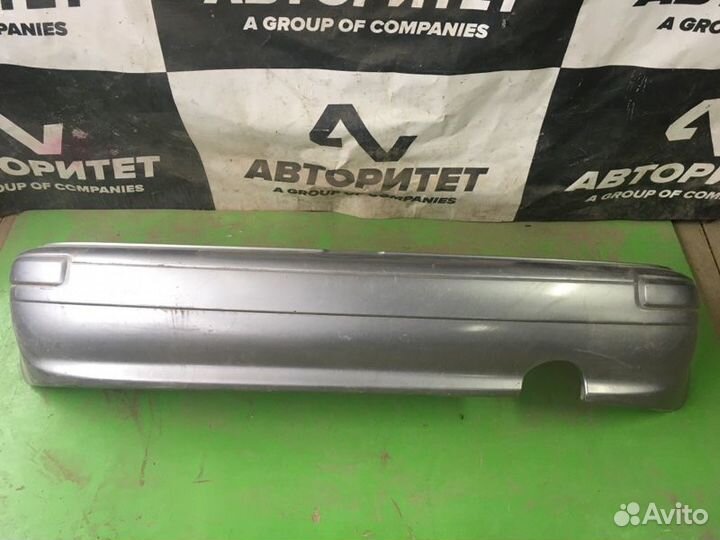 Бампер задний Nissan March K11