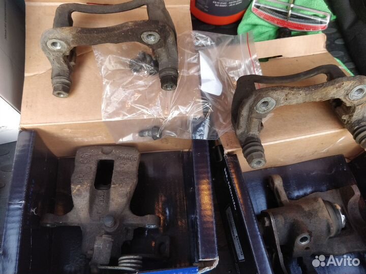 Суппорты задние левый и правый KIA RIO III