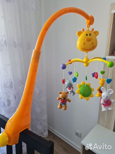 Мобиль карусель жирафики с музыкой крутится