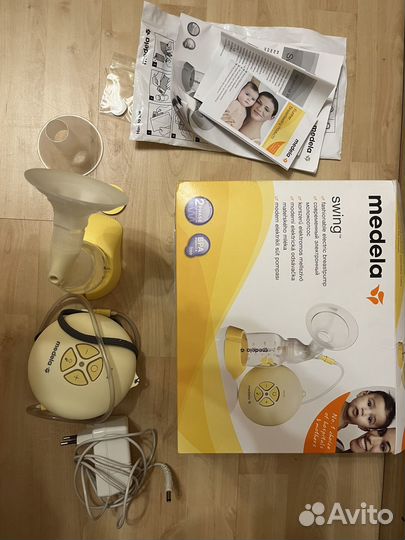 Молокоотсос medela swing электрический