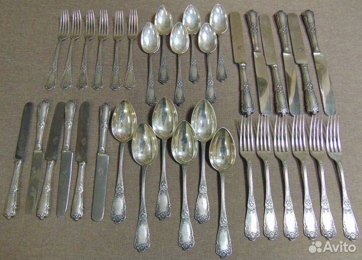 Комплект серебреных столовых приборов 84 проба