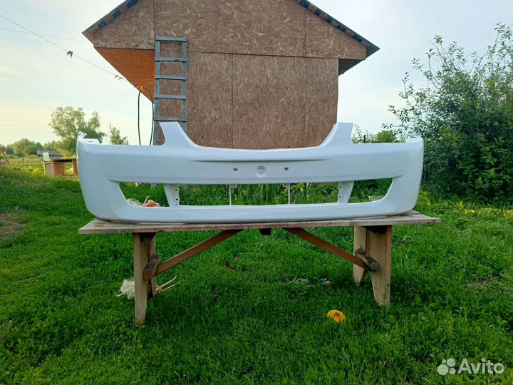 Передний бампер mazda 323