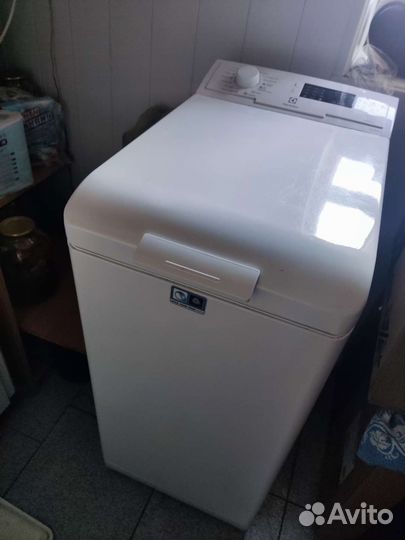 Стиральная машина с вертикальной загрузкой