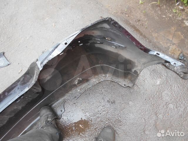 Бампер задний Nissan Tiida 2004-2010