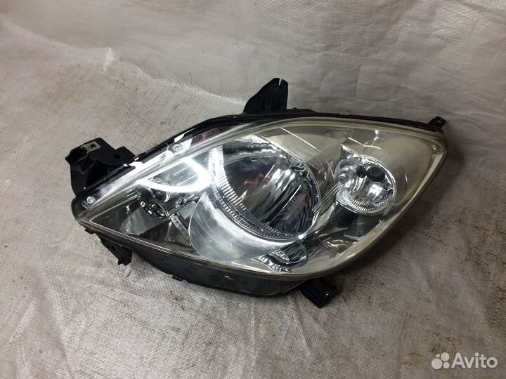 Фара левая Мазда Демио DY 5548