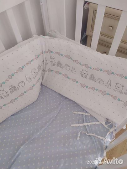 Детская кроватка с продольным маятником и ящиком