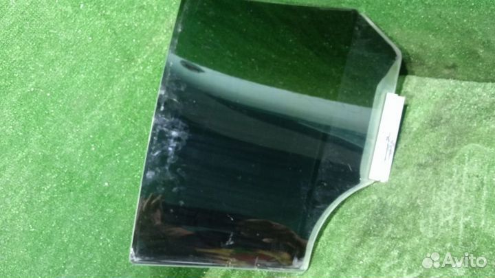 Стекло двери задней левой Opel Astra