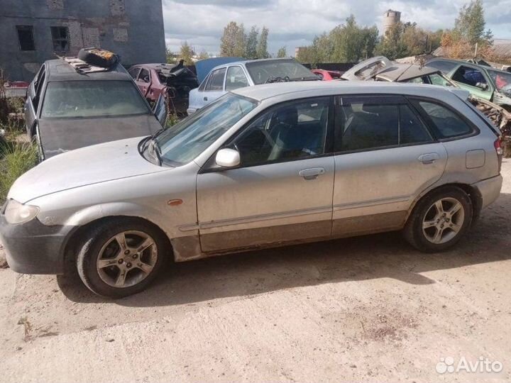 Бампер задний Mazda 323 BJ