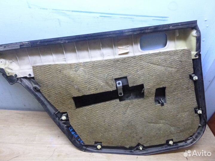 Обшивка двери задней правой Lancer Cedia