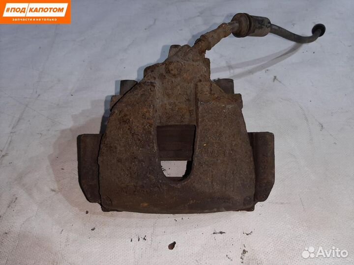 Суппорт тормозной передний левый Ford Focus