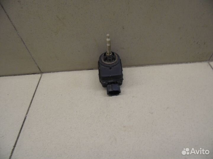 Моторчик корректора фары Primera P11E 1996-2002