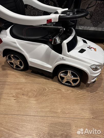 Детская машинка каталка с ручкой