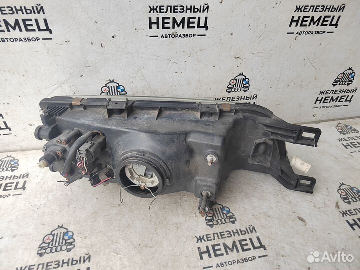 Фара левая Nissan Almera N15 до рест