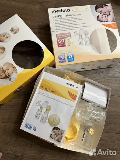 Молокоотсос medela swing maxi flex