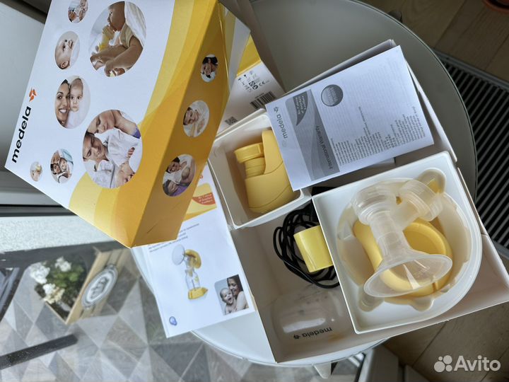 Молокоотсос medela mini electric электрический