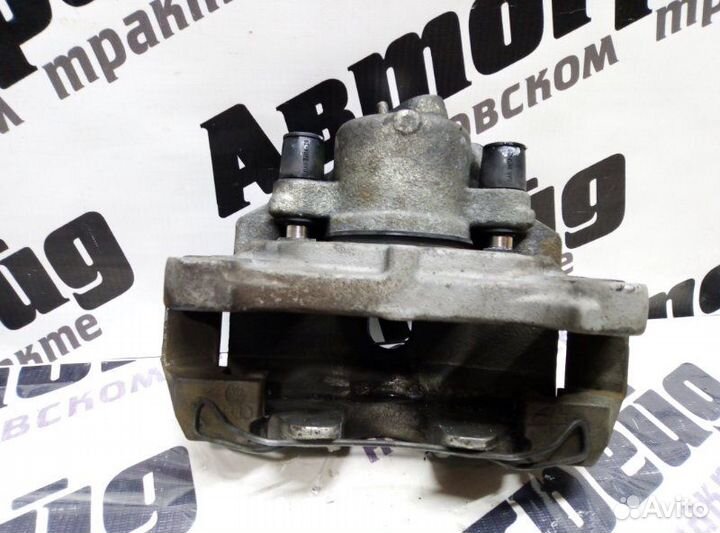 Суппорт тормозной передний правый Volkswagen