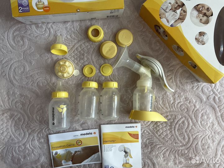 Молокоотсос ручной и бутылочки Medela