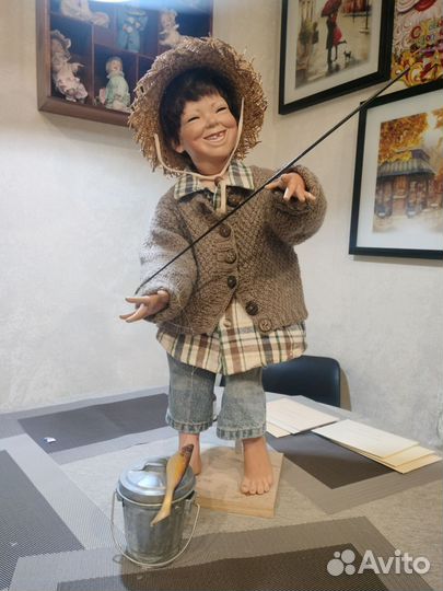 Чудесный мальчуган в образе рыбака