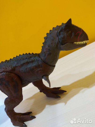 Динозавр Тираннозавр,карнотавр Jurrasic world