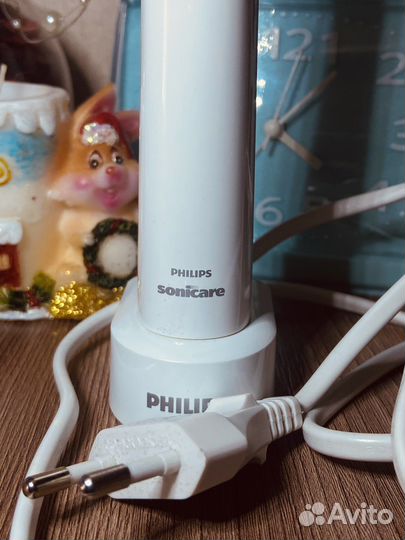 Электрическая зубная щетка philips