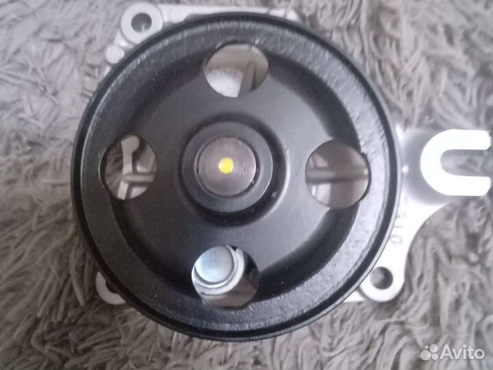 Помпа. mazda.ZJ.ZY