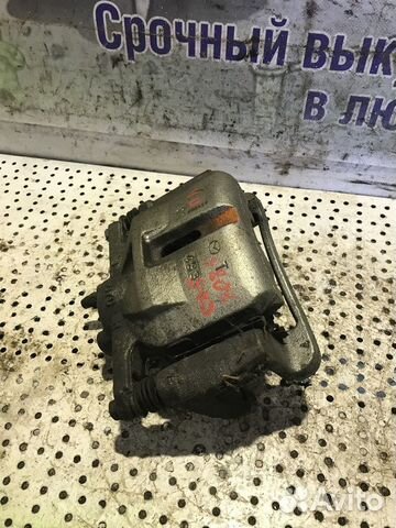 Суппорт тормозной передний левый Mazda CX-5