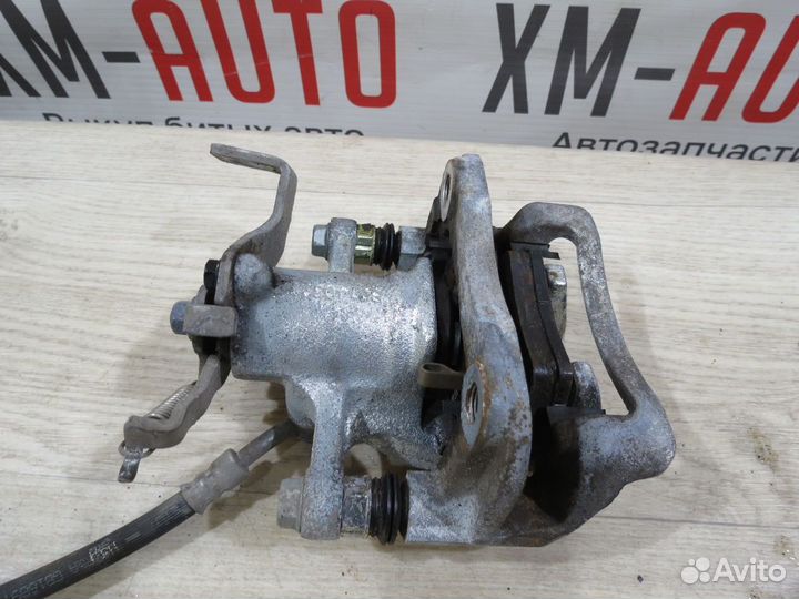 Суппорт тормозной задний левый Hyundai Creta 2