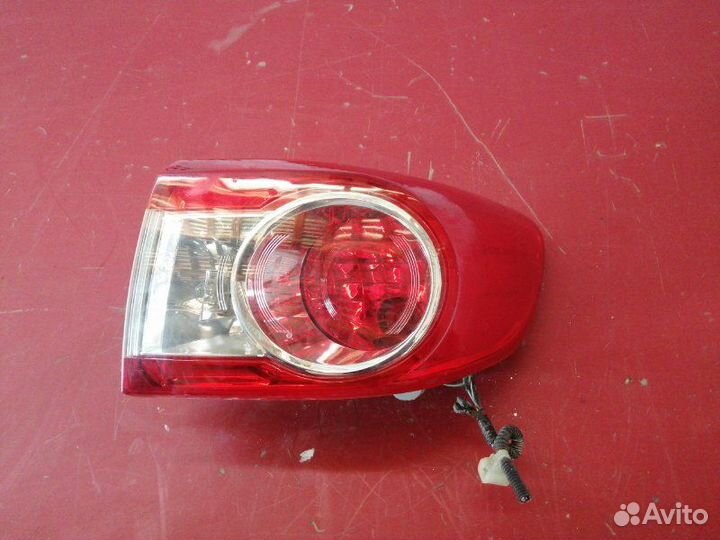 Фонарь наружный задний правый Toyota Corolla E150
