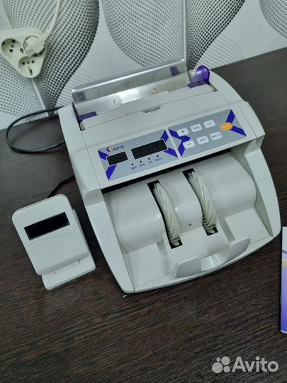 Машинка для счета банкнот
