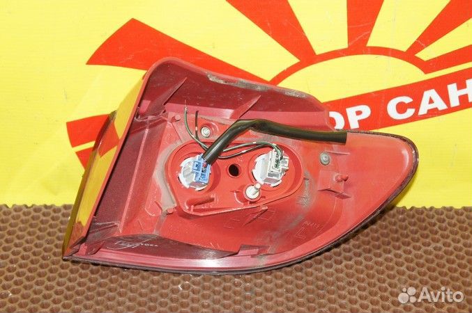 Фонарь Mazda Demio