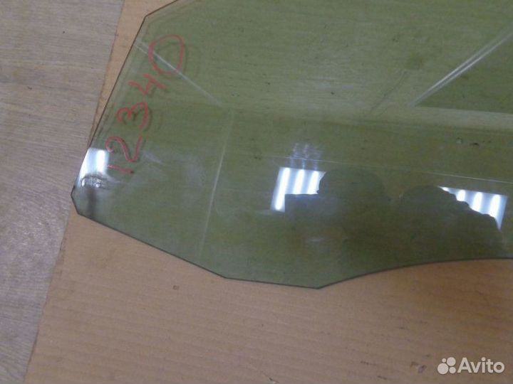 Стекло двери переднее левое Volkswagen Passat B6