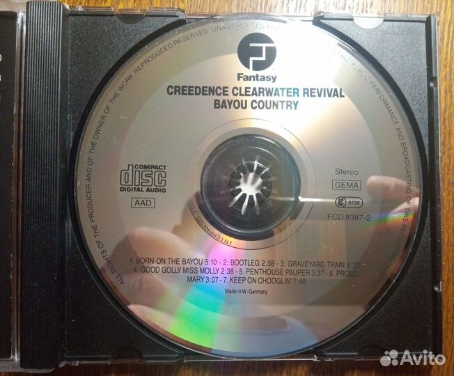 CD диски фирменные: Beatles, Black Sabbath и др