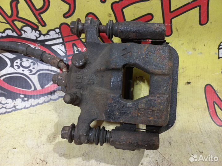 Суппорт тормозной задний правый Nissan Teana J31