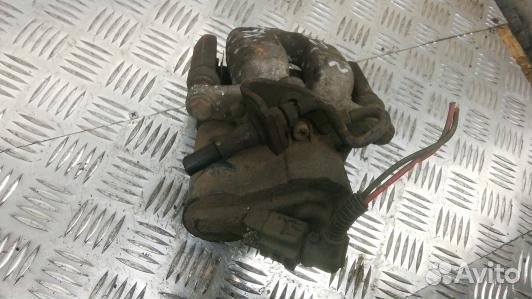 Суппорт тормозной задний левый volkswagen passat B