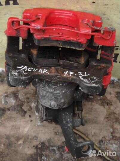 Суппорт задний левый Jaguar Xf