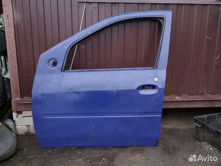 Дверь передний левый Renault Logan 1