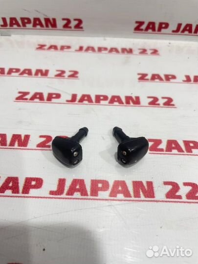 Форсунка омывателя передняя Mitsubishi L200 K74T