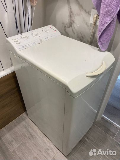 Стиральная машинка с вертикальной загрузкой