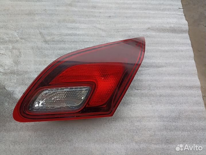 Фонарь в крышку багажника Opel Astra J 2009-2016