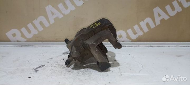 Суппорт тормозной правый Nissan Teana J31 VQ23