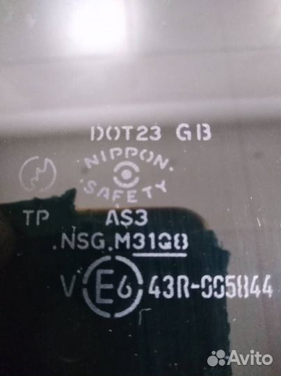 Стекло двери задней правой Mazda Familia BJ 1998-2