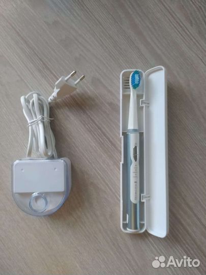 Электронная зубная щетка