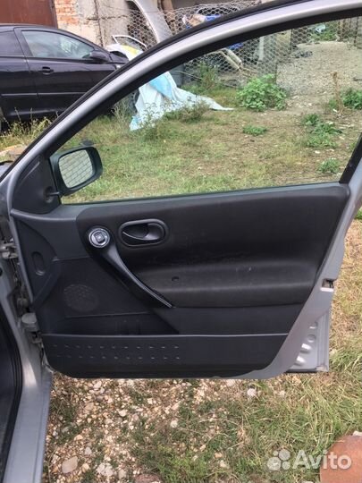 Рено Меган2 обшивка двери передней правой