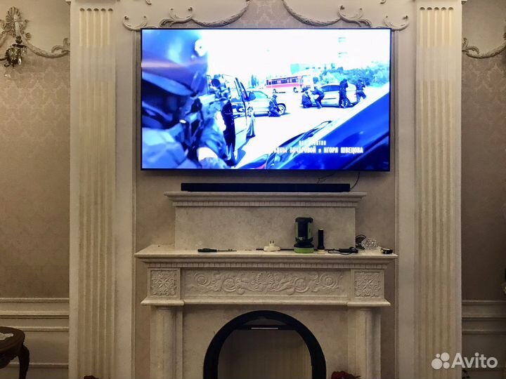 Повесить телевизор на стену