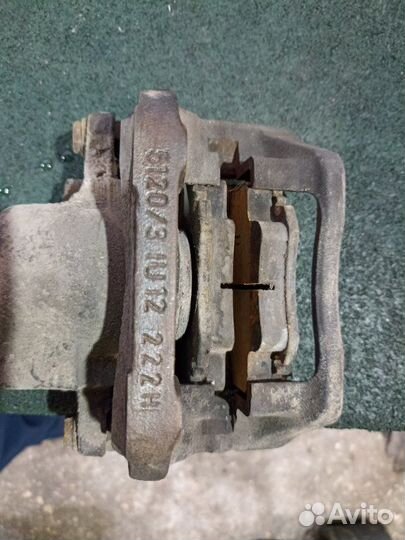 Суппорт тормозной передний левый Renault Logan 1